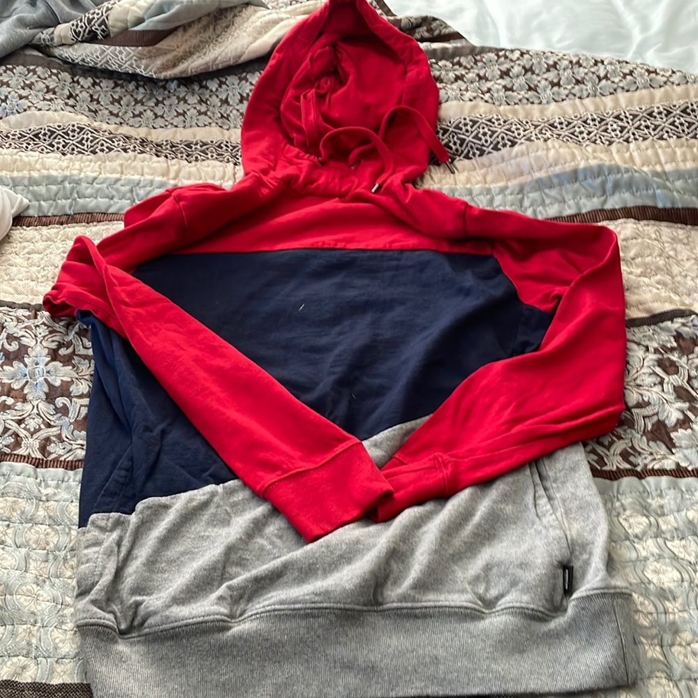 Red blue and gray hooded sweatshirt